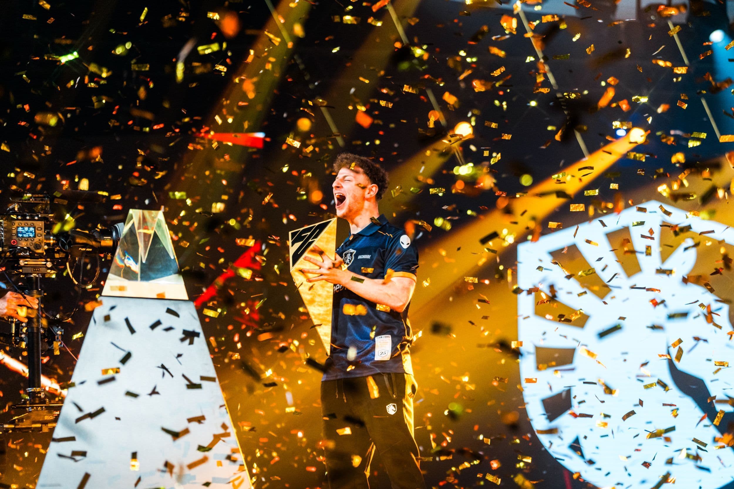 Liquid FC player celebrating a title win on stage